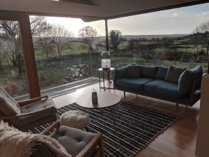 On your guided hiking holiday in Northern Ireland with us, it's hard to know whether to take in the 270 degree view out the two fully-glazed sides of the main living area in the Copper Barn. Or whether to stare at the gorgeous hand-crafted contemporary Irish-made interiors